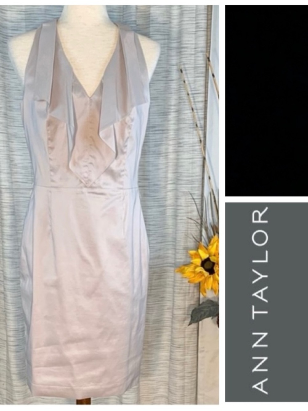 Ann Taylor solid tan sleeveless sheath dress.